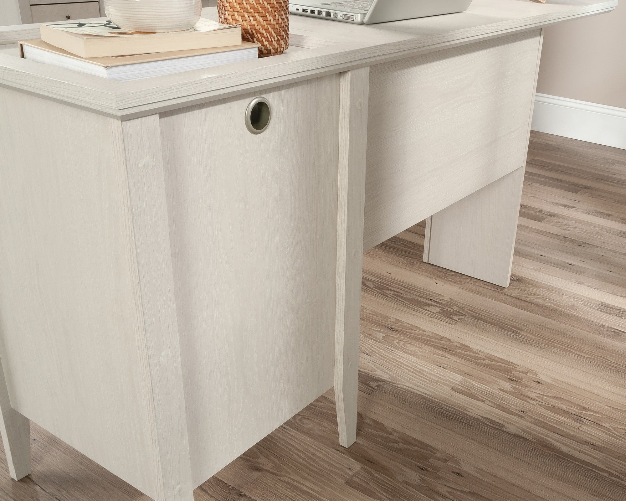 Larkin Ledge L-Shaped Desk with Drawers in Glacier Oak